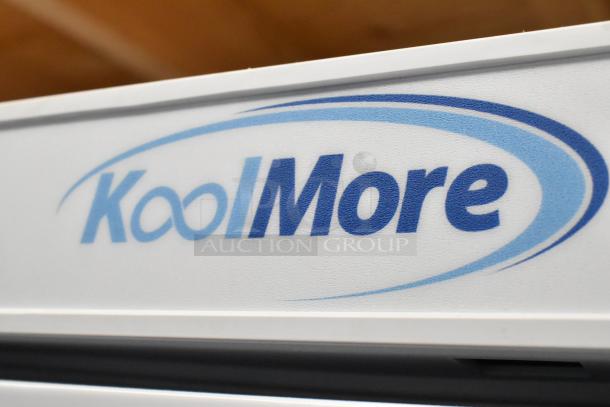 KoolMore KM-FMD12WH commercial freezer, 12 cu. ft., white, manual defrost, 115 volts, 1 phase. Brand logo visible.