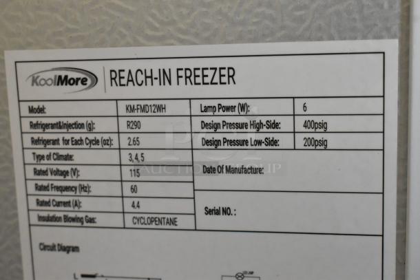 KoolMore KM-FMD12WH Commercial Freezer label showing model, refrigerant type R290, 115V, cyclopentane insulation.