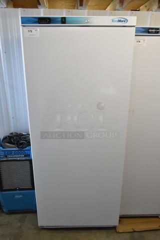 Brand new scratch and dent KoolMore KM-RMD20WH 20 Cu. Ft. commercial reach-in refrigerator, 115V, 1 phase, with visible label.