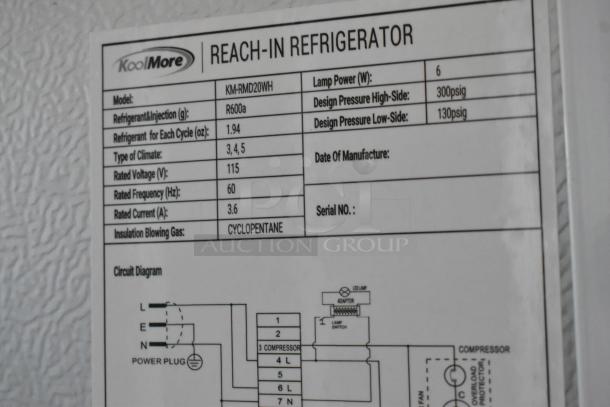 KoolMore KM-FMD12WH reach-in refrigerator label showing model KM-RMD20WH, 115V, R600a refrigerant, scratching visible.