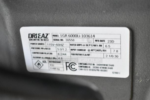 Label on Drieaz LGR 6000Li Dehumidifier showing model, serial number 30558, power source 115V, and manufacturing details.