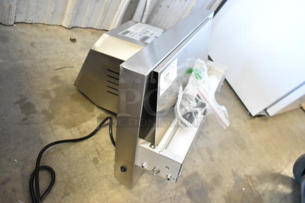 Brand new Estella 348EDS18S stainless steel dough sheeter. One-stage, 18" countertop, 120V, 1-phase, minor scratches.