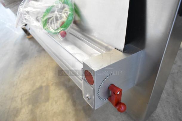 Brand new Estella 348EDS18S stainless steel 18" countertop dough sheeter. Visible red knob. 120V, 1 Phase. Scratch and dent condition.