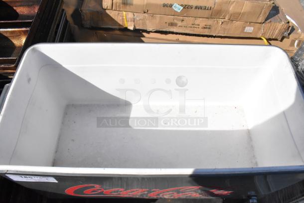 Coca Cola poly portable ice bin, white interior, black exterior with logo. Good condition, ideal for events.