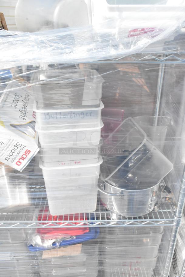 Chrome 4-tier wire shelving with poly drop-in bins, ingredient bin, and poly bins. Includes labels like "Butterfinger." Buyer must dismantle.