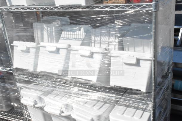 Chrome finish 4-tier wire shelving unit with ingredient bins, wrapped for shipping. Buyer must dismantle. Ideal for storage.