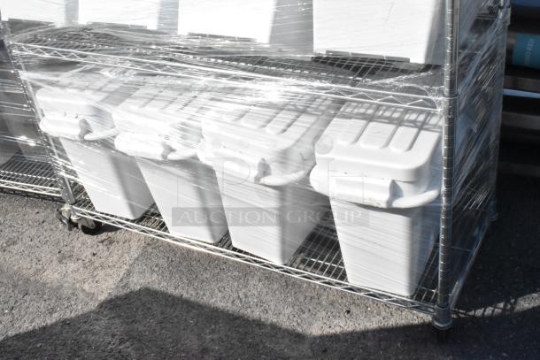 Chrome finish 4-tier wire shelving unit with ingredient bins, wrapped in plastic. Requires buyer dismantling; freight applies.