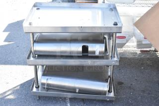 Stainless steel 3-tier stand with two iced tea holder dispensers, in fair condition. Features sturdy metal construction.