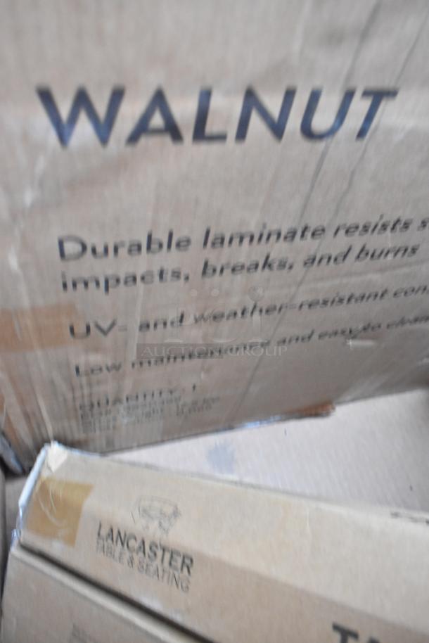 Cardboard boxes labeled "WALNUT" and "LANCASTER TABLE & SEATING"; durable laminate; scratch-and-dent condition.