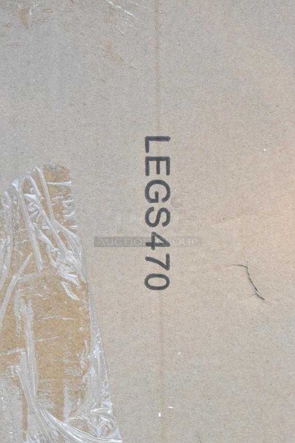 Cardboard box for Steelton 522US3216 utility sink; marked "LEGS470"; wrapped in plastic; box shows scratches.