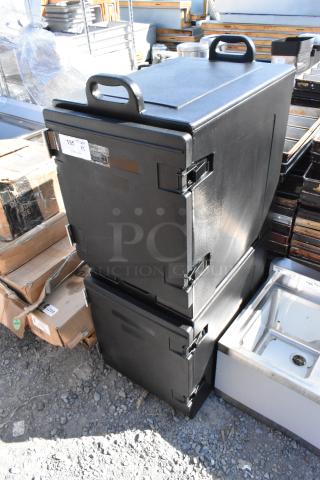 Black poly insulated food carrying catering cases, brand new, scratch and dent condition, with sturdy handles.