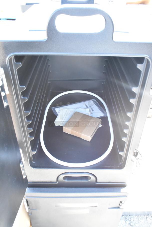 Black poly insulated food carrying case, brand new with minor scratches. Includes user manual and components inside.