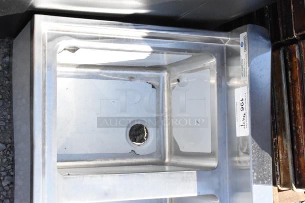 Brand new Steelton 522BS3T38 underbar sink, 3 bowl, 18 gauge, 38" x 18 3/4", with visible scratch and dent, labeled for sale.