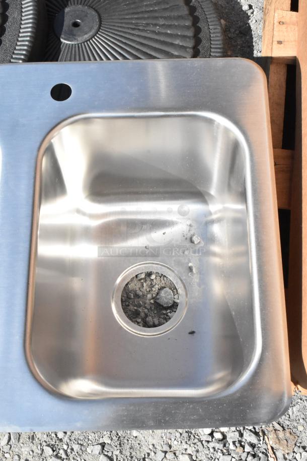 Brand new stainless steel 3-bay drop-in sink, scratch and dent condition, commercial-grade, features visible marking.