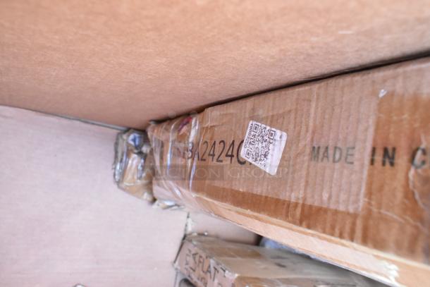 Cardboard box labeled "Made in China" with visible QR code and item code "A2424C," part of a scratch and dent lot.