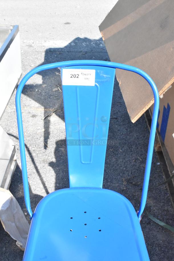 Blue Tolix-style bar height chair with a scratch and dent condition, marked as auction lot 202.