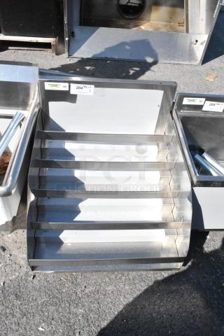 BRAND NEW Regency 600LDR2624 stainless steel 24" five-tier liquor display rack, 26" deep, scratch and dent condition.