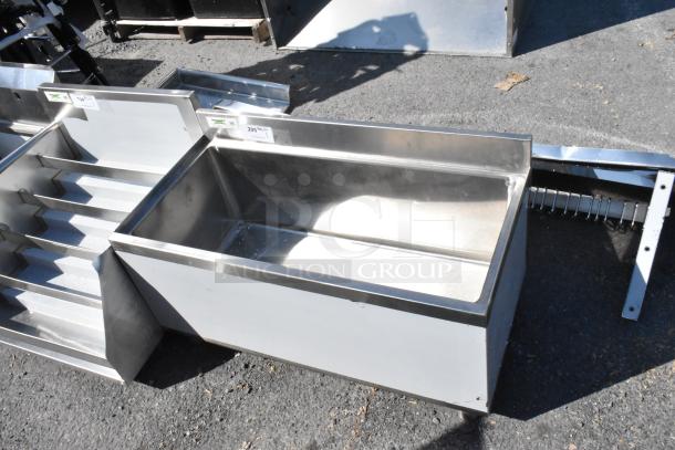 BRAND NEW Regency 600IB1836 18"x36" underbar ice bin with 7 circuit post-mix cold plate, bottle holders, 79 lb capacity.