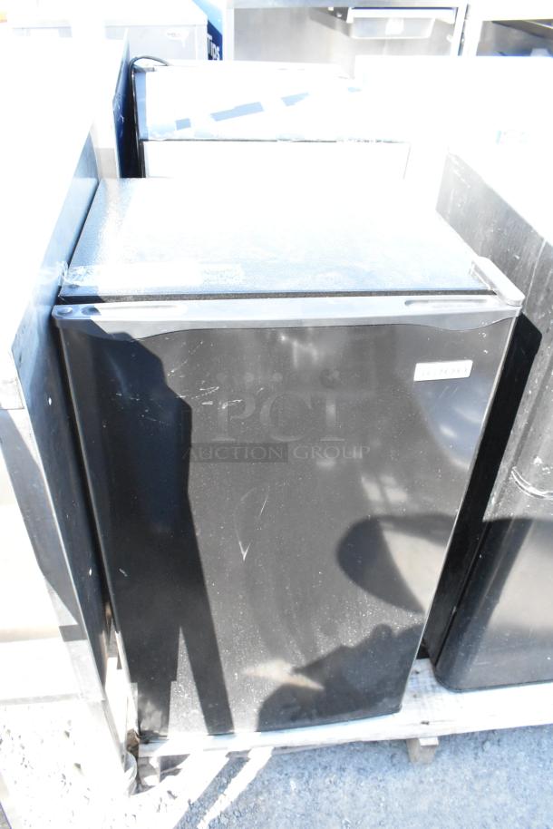 Four mini coolers include Nostalgia IRF32BK, Black & Decker BCD33B, Accucold ARG3PV, Galanz. Some scratches visible.