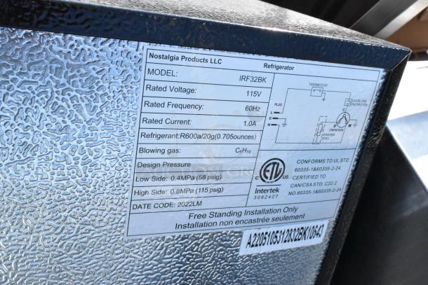 Nostalgia IRF32BK mini cooler, label shows 115V, 60Hz, R600a refrigerant, ETL certified. Auction includes four coolers.