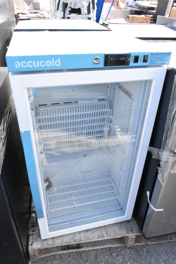 Four mini coolers including Nostalgia IRF32BK, Black & Decker BCD33B, Accucold ARG3PV, and Galanz. Auction item lot.