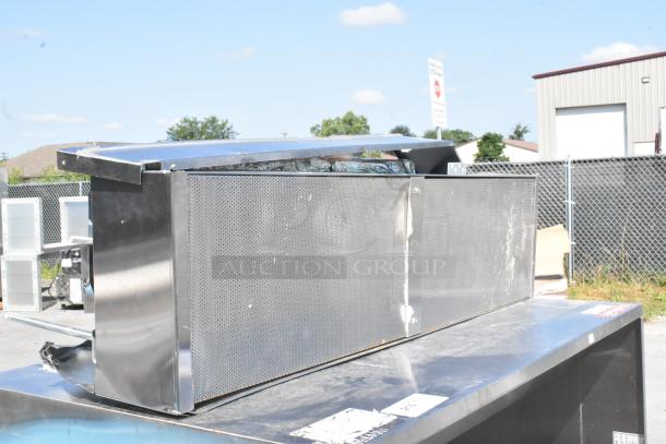 4' CaptiveAire 4830 ND-2 stainless steel grease hood with make-up air vent, visible wear, outdoor setting.