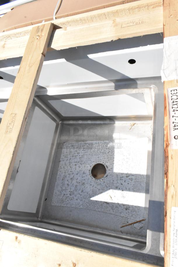 Brand new Elkay 1-32126X24-2-24 stainless steel commercial 3 bay sink with dual drain boards, shown crated. No legs included.