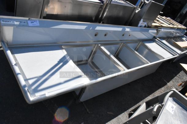 BRAND NEW Regency 600S3242424S stainless steel sink, 124" with 3 compartments, 14 gauge, 2 drainboards, slight scratches visible.