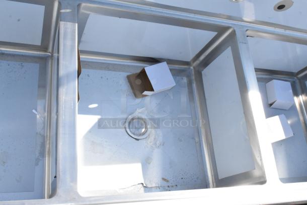 BRAND NEW SCRATCH AND DENT Regency 600S3242424S 124" stainless steel sink with three 24"x24"x14" compartments, two drainboards.