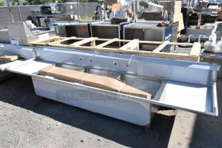 BRAND NEW SCRATCH AND DENT! Regency 600S3242424S stainless steel 3-compartment sink, 2 drainboards, 24"x24"x14" bowls, 14 gauge.