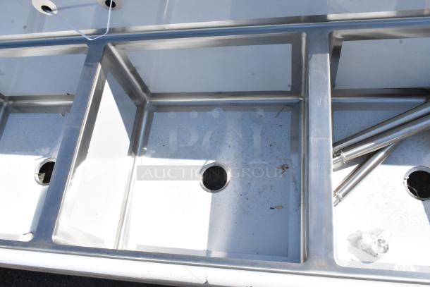 BRAND NEW Regency 600S3242424S stainless steel three-compartment sink, 124", features 14-gauge steel, two drainboards.