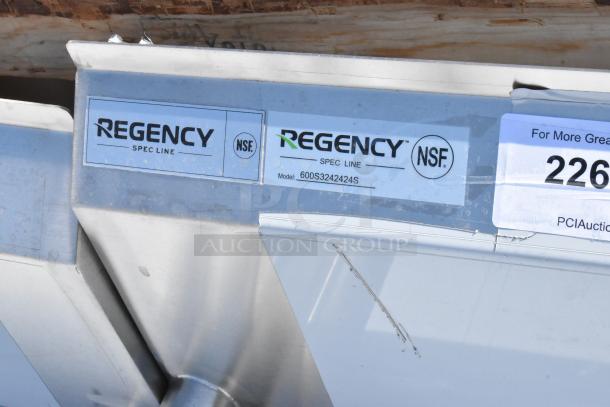 BRAND NEW Regency Spec Line model 600S3242424S 124" stainless steel 3-compartment sink, 14 gauge, NSF certified, with scratches.