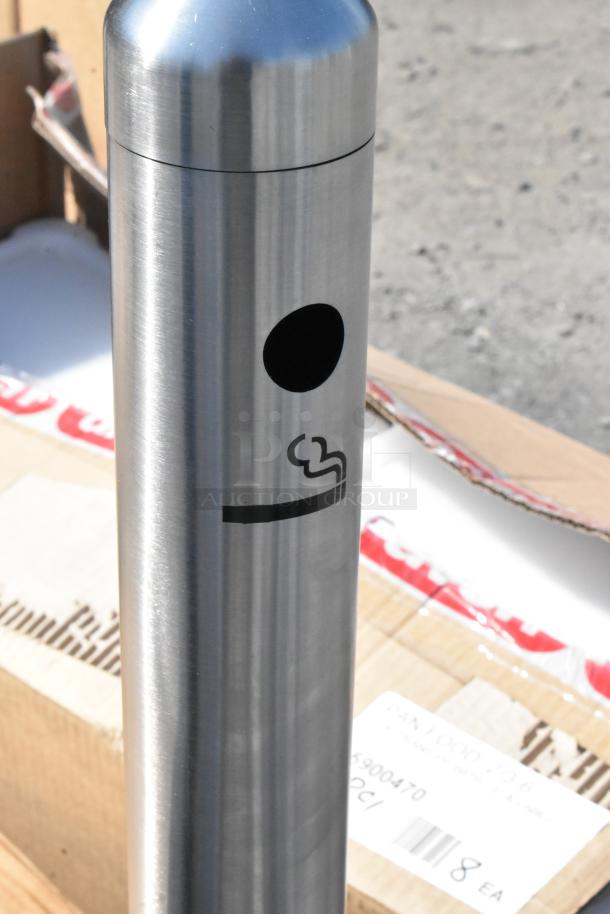 Chrome Smokers Outpost, sleek design with cigarette symbol, in excellent condition. Part of a lot including black model.