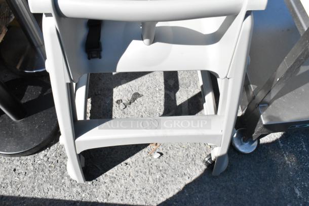 BRAND NEW Rubbermaid FG780508PLAT Platinum Sturdy Chair, scratch and dent, assembled with wheels, restaurant use.