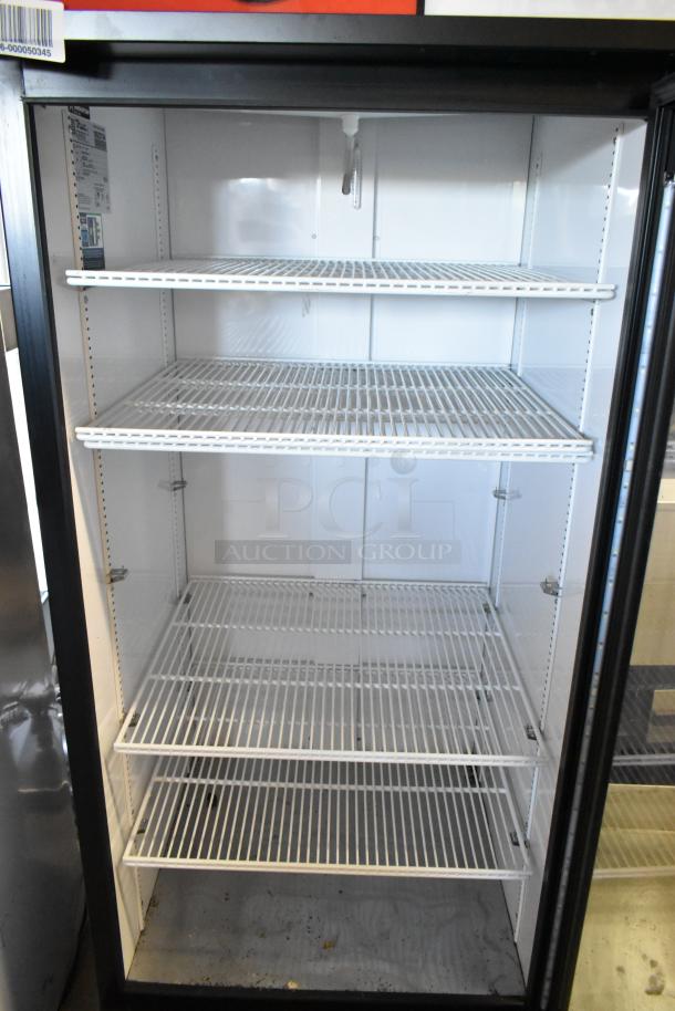 2023 True GDM-26-HC commercial cooler, single glass door, poly-coated racks, 115 volts, 1 phase, excellent condition.
