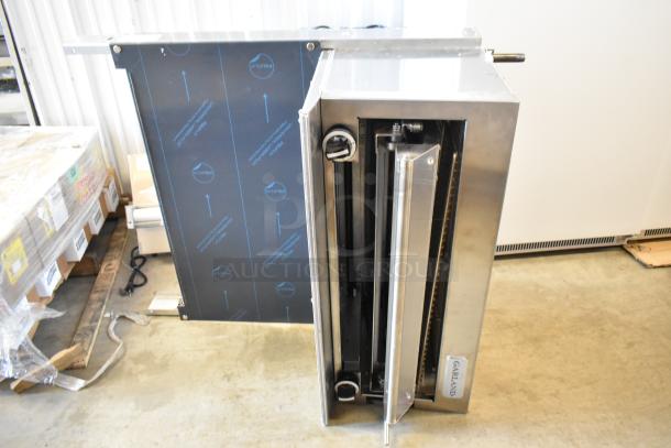 Garland stainless steel commercial salamander cheese melter with back splash, natural gas powered, mint condition.