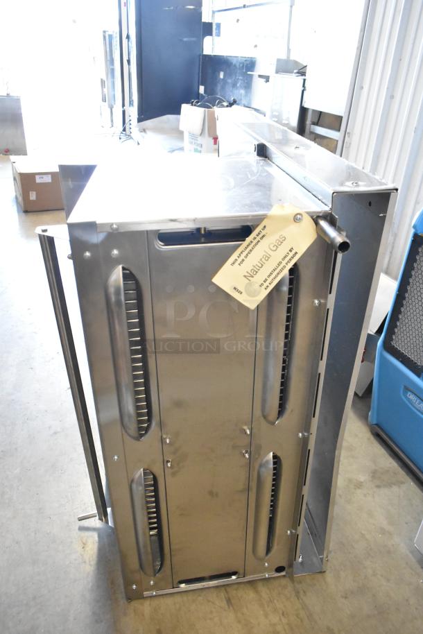Garland stainless steel commercial salamander cheese melter, natural gas-powered, with back splash, new condition, natural gas tag.