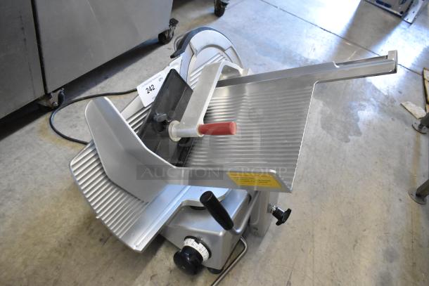 Bizerba GSP H metal commercial countertop meat slicer, 120 volts, 1 phase, with safety guards and thickness dial, excellent condition.