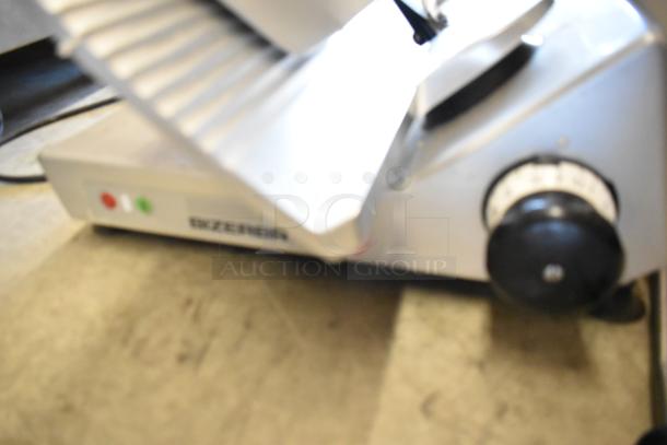 Bizerba GSP H metal meat slicer, commercial countertop model. Features 120 volts, 1 phase. Appears in used condition.