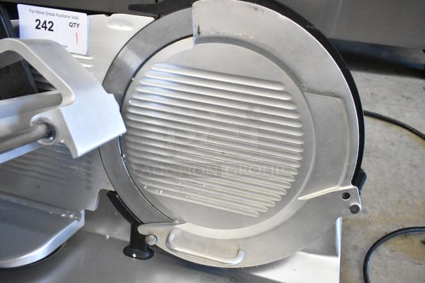 Bizerba GSP H Metal Commercial Meat Slicer, 120V, 1 Phase, in good condition with visible blades and auction tag.