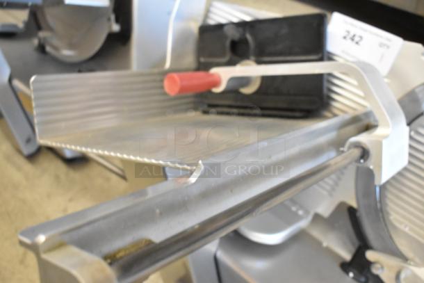 Bizerba GSP H metal commercial meat slicer, 120 volts, 1 phase. Features a sharp blade and sturdy construction.