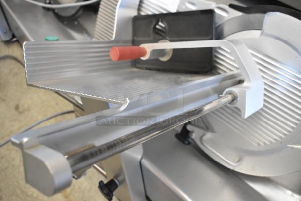2020 Bizerba GSP H commercial meat slicer, silver, excellent condition, 120V, 1 phase, features precision blade and safety handle.