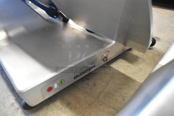 Bizerba GSP H commercial countertop meat slicer, metal, 120 volts, 1 phase, with visible model label and control buttons.
