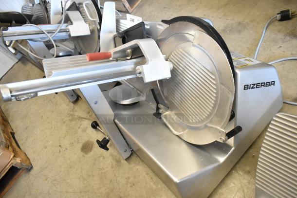 Bizerba GSP H commercial meat slicer, 120V, 1 phase, stainless steel, excellent condition. Brand logo visible.