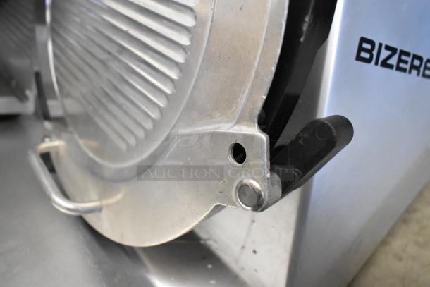 Bizerba GSP H metal commercial countertop meat slicer in good condition, showing blade and brand logo, 120V, 1 phase.
