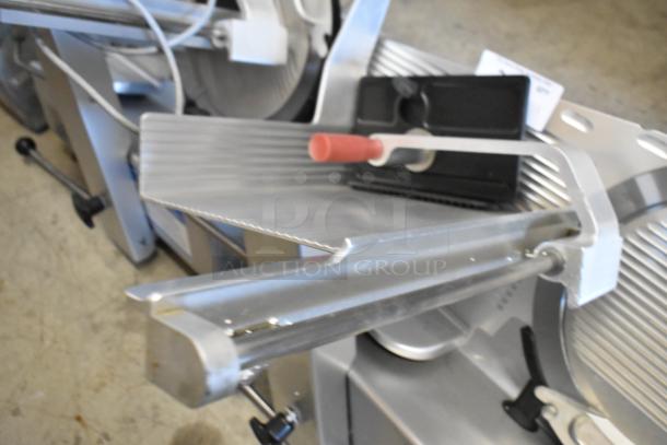 Bizerba GSP H metal commercial meat slicer, 120 volts, 1 phase, in good condition, showing blade and slicer components.