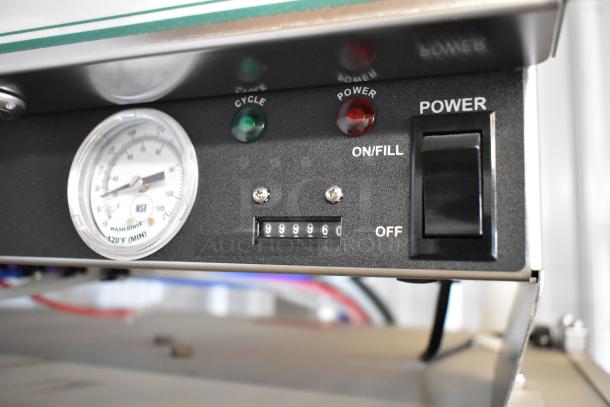 Stainless steel Noble Wareforce I-E dish machine panel with power switch and temperature gauge, showing cycles.