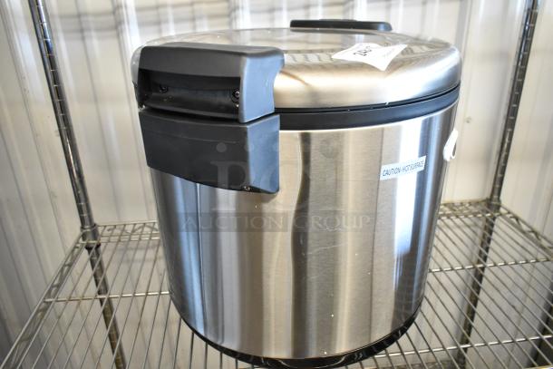 Brand new 2023 Galaxy 177RWG90 90-cup electric rice warmer. Features stainless steel body, "Caution: Hot Surface" label, minor dents.
