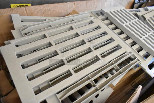 Box of Cambro gray poly Metro shelf pieces, featuring interlocking slots. Appears unused, ideal for modular shelving.