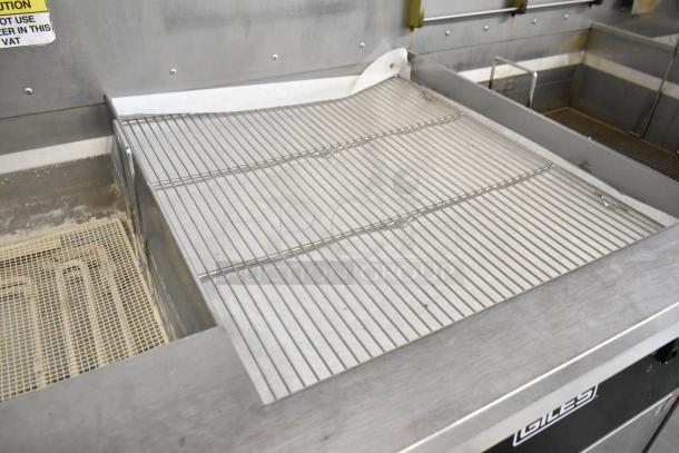 Giles EOF Stainless Steel 3 Bay Deep Fat Fryer with dumping station on casters. Electric, 480V, used condition. Caution sign visible.